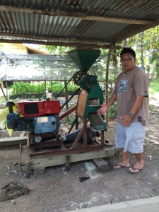Our guide Albert explaining how this machine helps in harvesting rice more efficiently